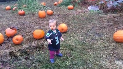 Little Girl Loves Her Pumpkin And All It's Flaws
