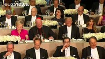 Trump and Clinton trade jokes and insults at charity dinner