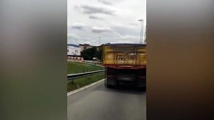 Truck Driver Pushes Car Down Highway