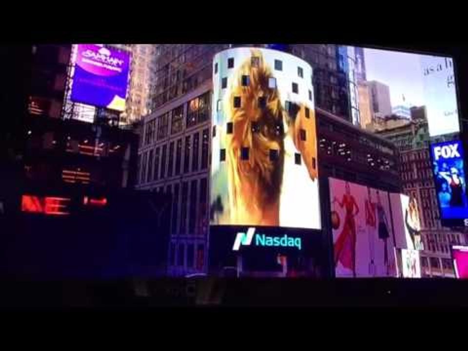 Olivia Hutcherson on Nasdaq Billboard in Time Square, NY with 5 Under 40