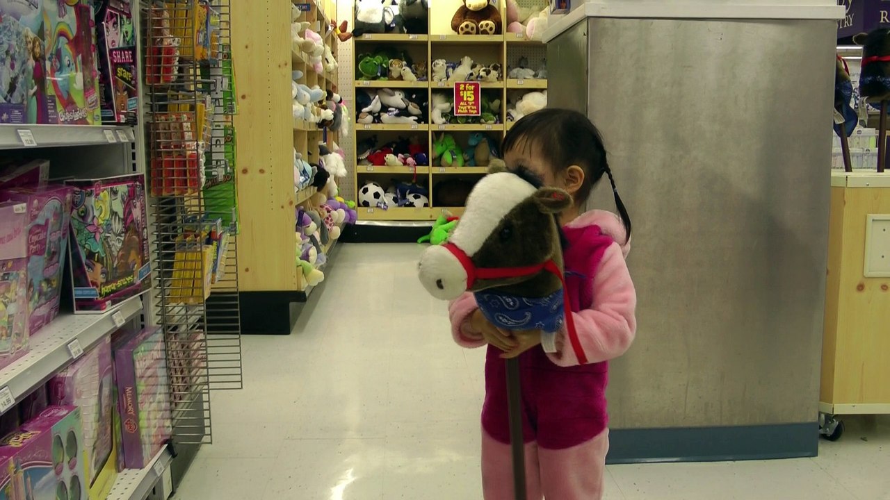 Girl Playing Stick Horse*
