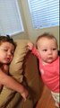 Baby tries to wake her brother / sister.