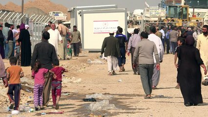 Des déplacés des alentours de Mossoul arrivent au camp de Khazir