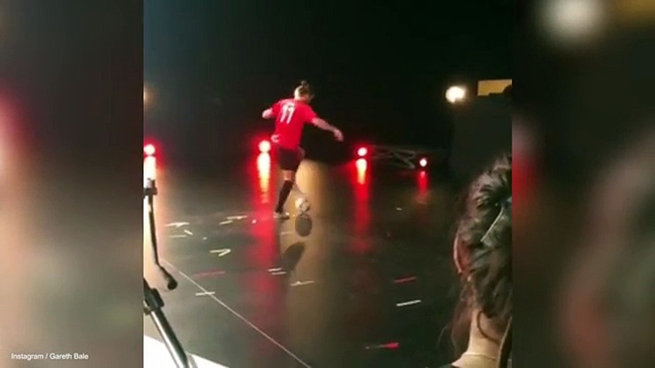 Real Madrid's Gareth Bale shows off his football skills on set