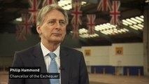 Hammond pleased to see economy 'still resilient'