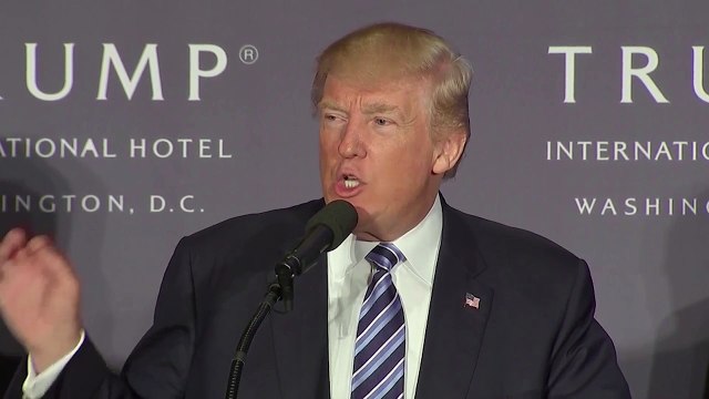 Trump opens his new D.C. hotel, met with protest