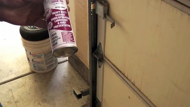 Lubricating a garage door repair tips