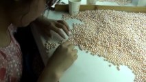 Comment sont produites les perles d'huitres en chine ?