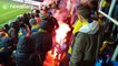 Football fans throw flares at each other in Poland