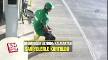 Otomobilin altında kalmaktan saniyelerle kurtuldu