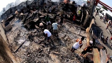 Unas 2.000 familias sin hogar por un fuego en suburbio en Manila