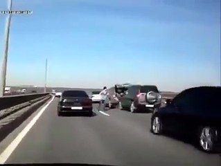 Why in the hell would you try to repair your vehicle in the middle of the highway..