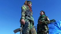 Iranian Kurdish women battle IS with songs