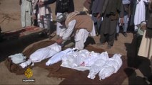 Mourners bury Afghan civilians killed in NATO bombing