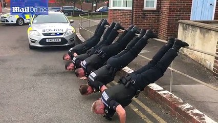 Cops Battle to Complete Push Up Challenge
