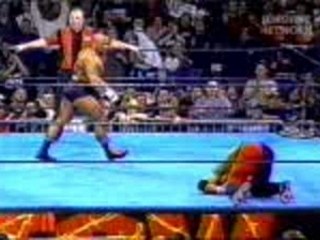 ECW - Taz T-Bone Suplexes Dreamer Off A Balcony Through A Ta