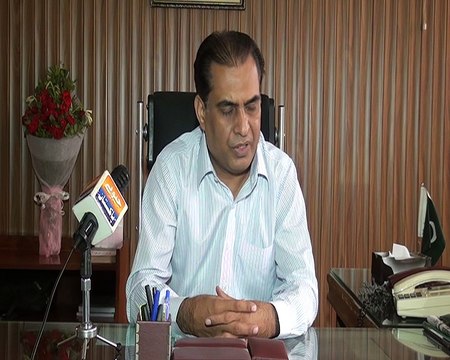 Muhammad Zahid Mian Director Education Colleges, Lahore Division talking with Shakeel Anjum Jeeveypakistan.com