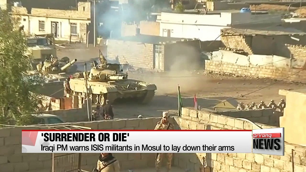 Iraqi PM warns ISIS to lay down arms as militants fortify Mosul