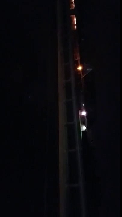 Bright series of lights in very distant horizon, just over trees,Orland Park IL,US,04.11.2016.
