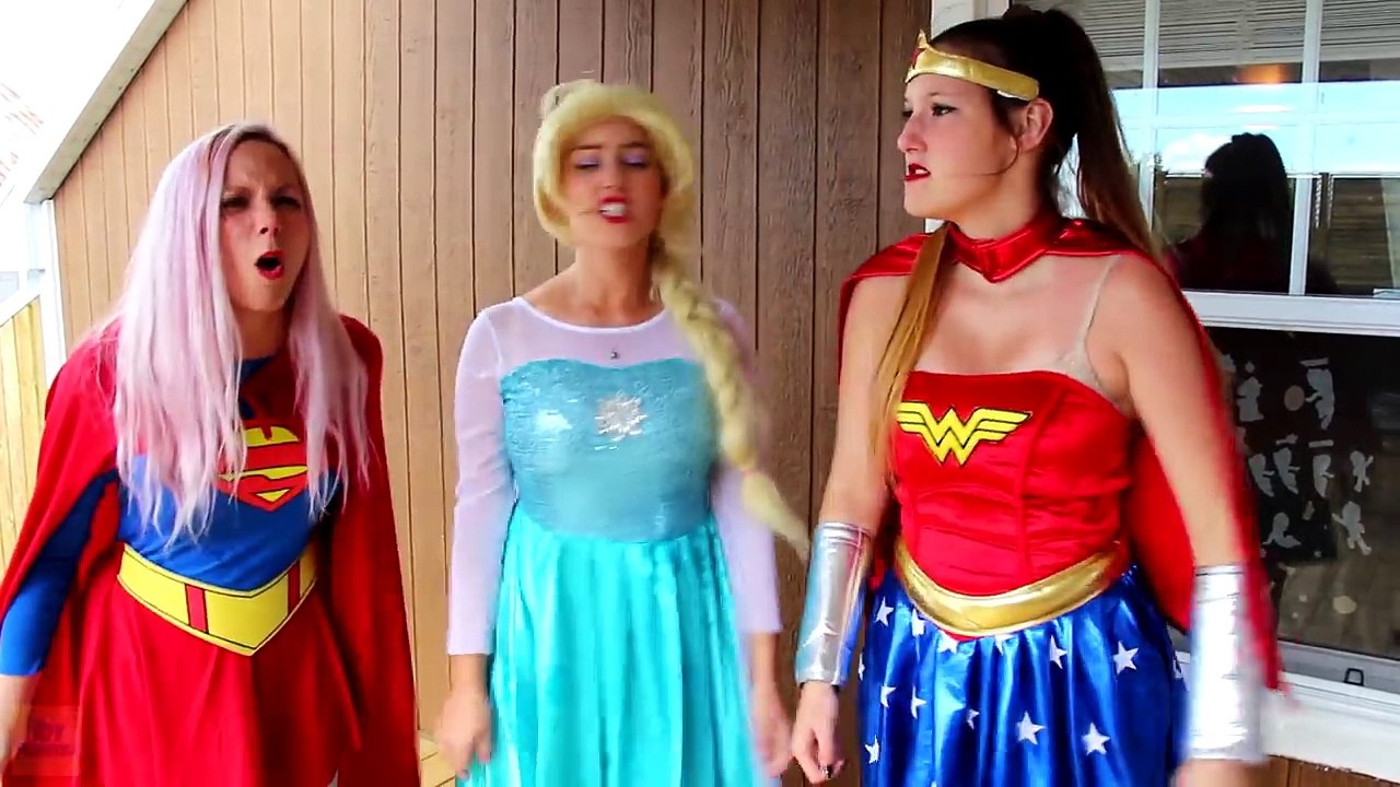 Spiderman vs Frozen Elsa WATER GUNS BATTLE! w/ Pink Spidergirl Joker Maleficent Anna Toys & Candy :)