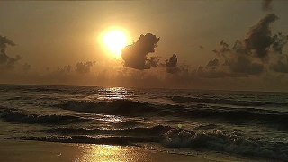 Amazing slow motion video of Sea during Sunset