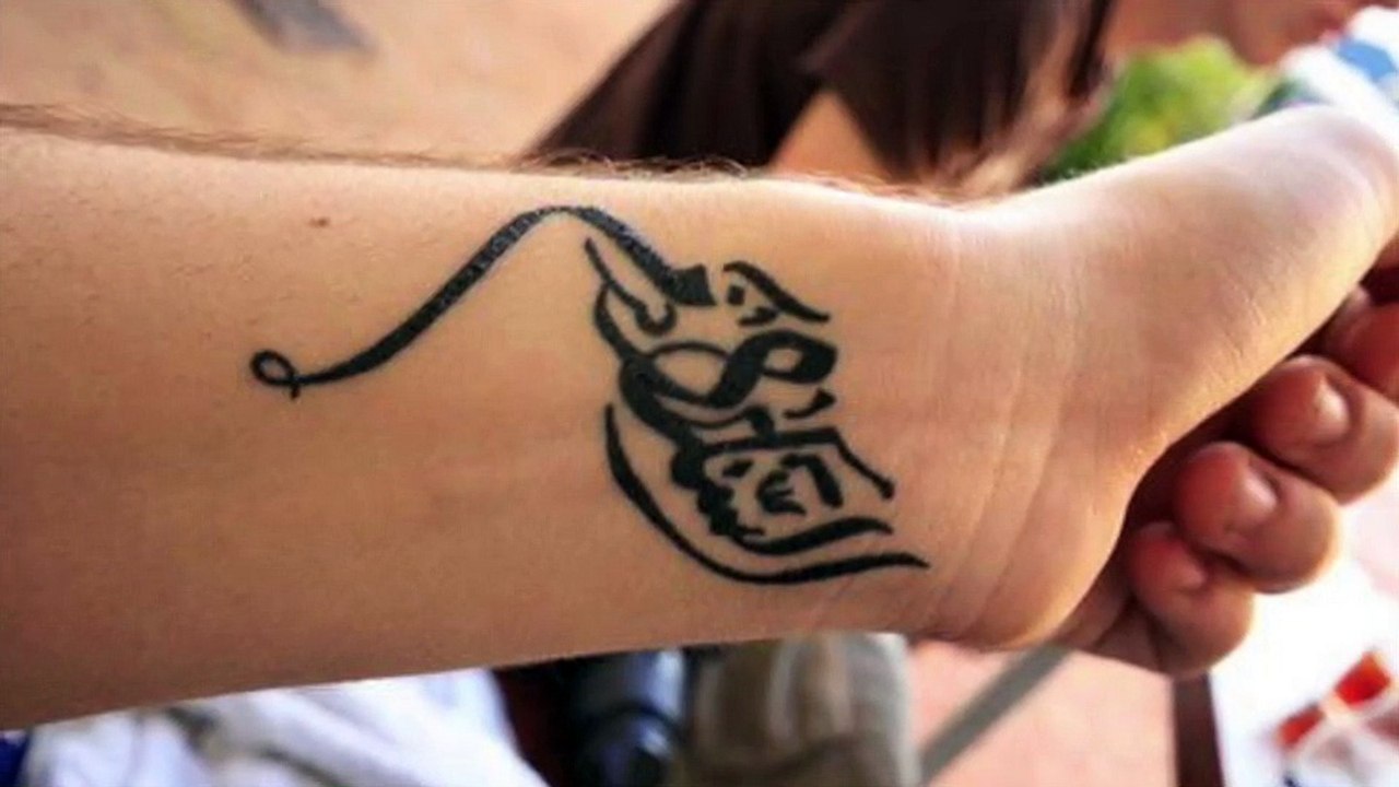 Modèles tatouage phrase arabe