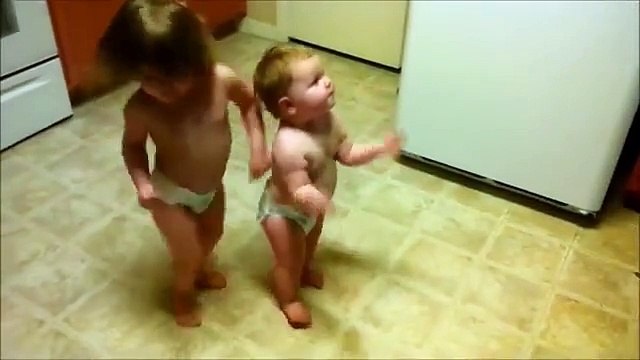 The music starts and this baby starts to dance