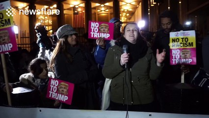 People protest against Trump outside the US Embassy in London