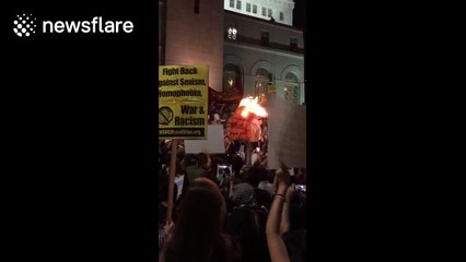 Protesters burn Donald Trump effigy