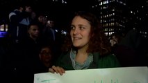 A young teacher is among the thousands of people protesting Donald Trump in New York City
