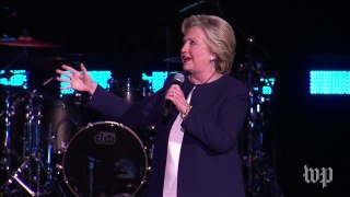Clinton says 'love trumps hate,' Jay Z performs 'Hard Knock Life'