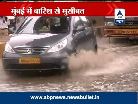 Rains disrupts local train services and traffic in Mumbai