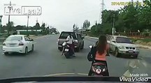 Scooter riders sent flying in terrible road crash