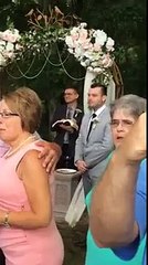 The groom waiting at the altar. Here is his reaction