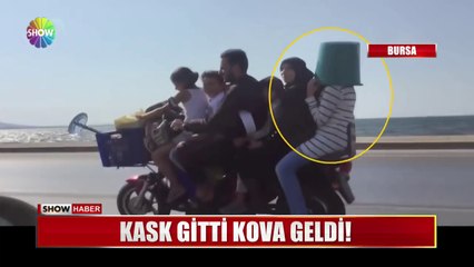 Kask yerine kova taktı!