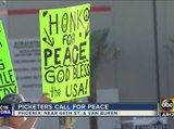 Women protest outside of ABC15 station