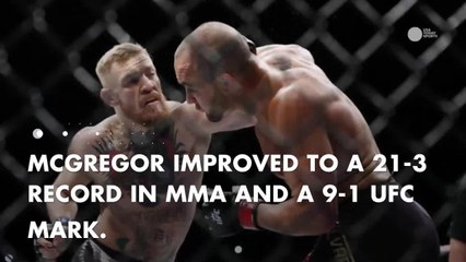 Conor McGregor makes history with UFC lightweight title win