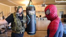 Spiderman vs Bane In Real Life Spiderman wears Batman Suit