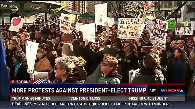 Anti-Trump protesters gather outside the White House