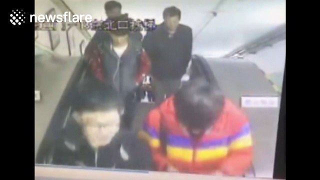 Nuisance man jumps on escalator and causes it to stop suddenly