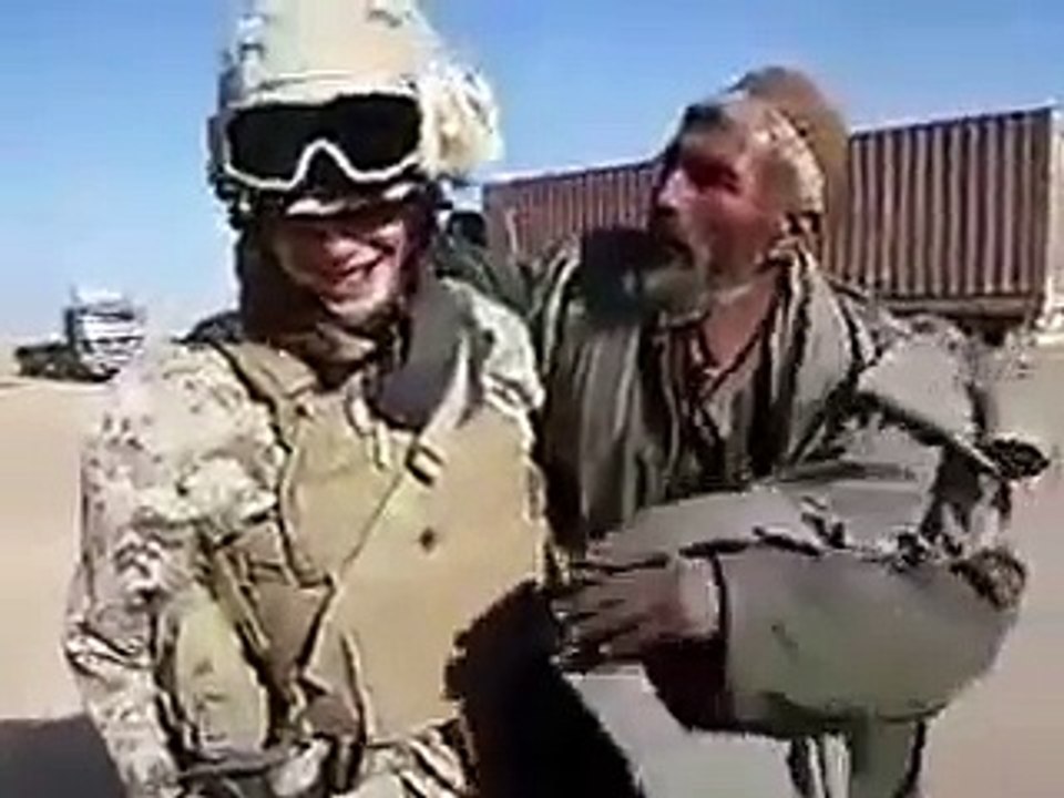 Amircan Shoulder Kiss With Afghan Man