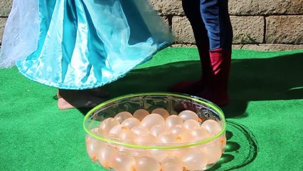 SPIDERMAN VS DISNEYS FROZEN ELSA JOKER :) WATER BALLOON BATTLE! NEW MOVIE TRAILER FILM IN REAL LIFE