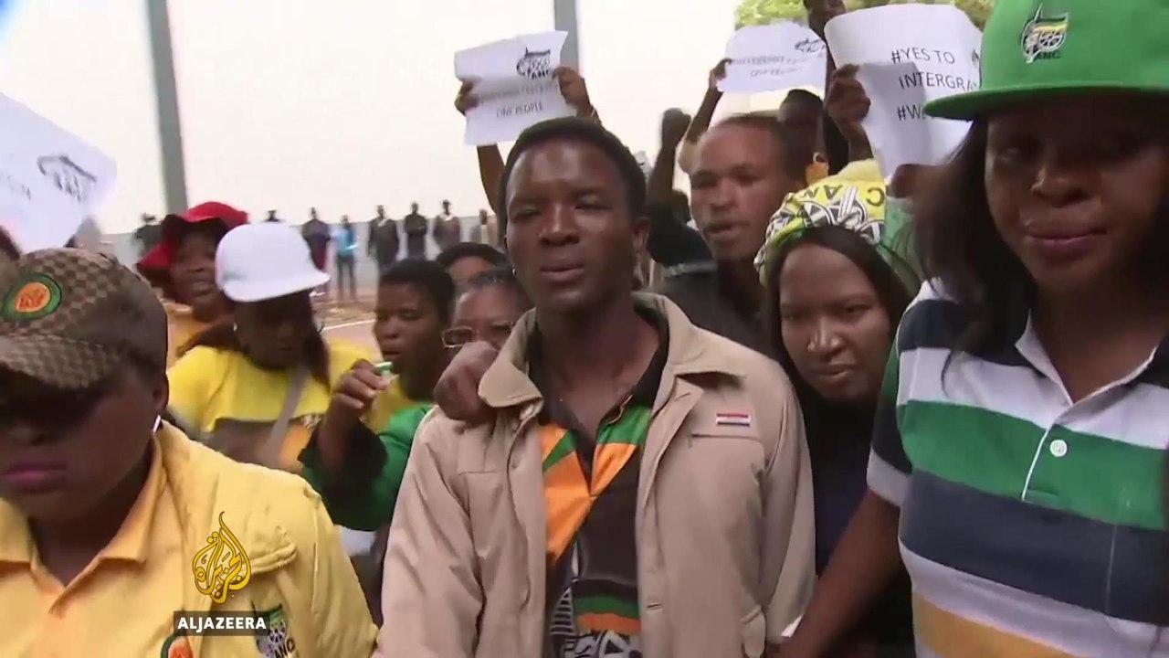 S Africa: White men in court for forcing black...