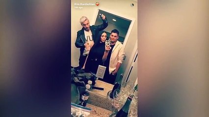 Kim Kardashian and Andy Cohen goof around back stage