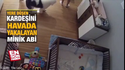 Yere düşen kardeşini havada yakalayan minik abi