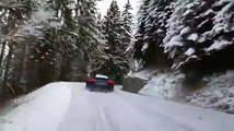 Audi R8 drifting up a snowy mountain