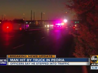 Man dies after being hit by car in Peoria