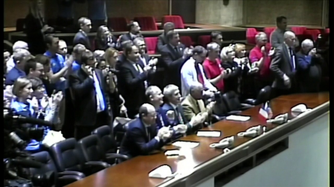 Russian spaceship delivers three astronauts to space station