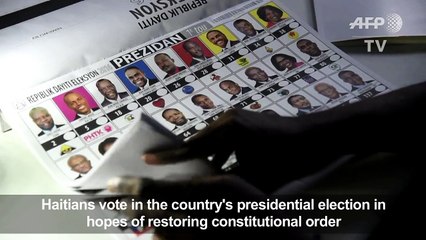 Haitians vote hoping to restore constitutional order