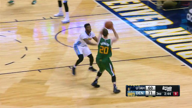Rudy Gobert pose un dunk main gauche sur Jokic